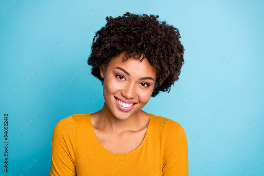 Close up photo of charming attractive nice afro american girl enjoy autumn rest relax free time wear pullover isolated over blue color background Close up photo of charming attractive nice afro american girl enjoy autumn rest relax free time wear pullover isolated over blue color background