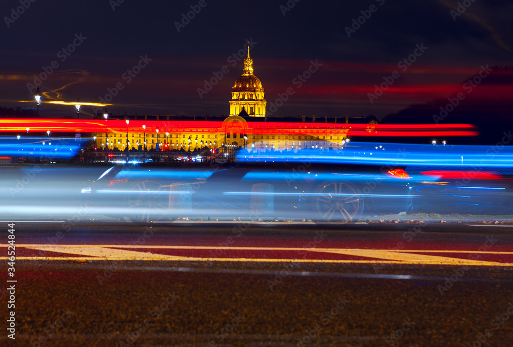 Fototapeta premium Avenue du Marechal Gallieni in the night , Les Invalides view of famous building in Paris 