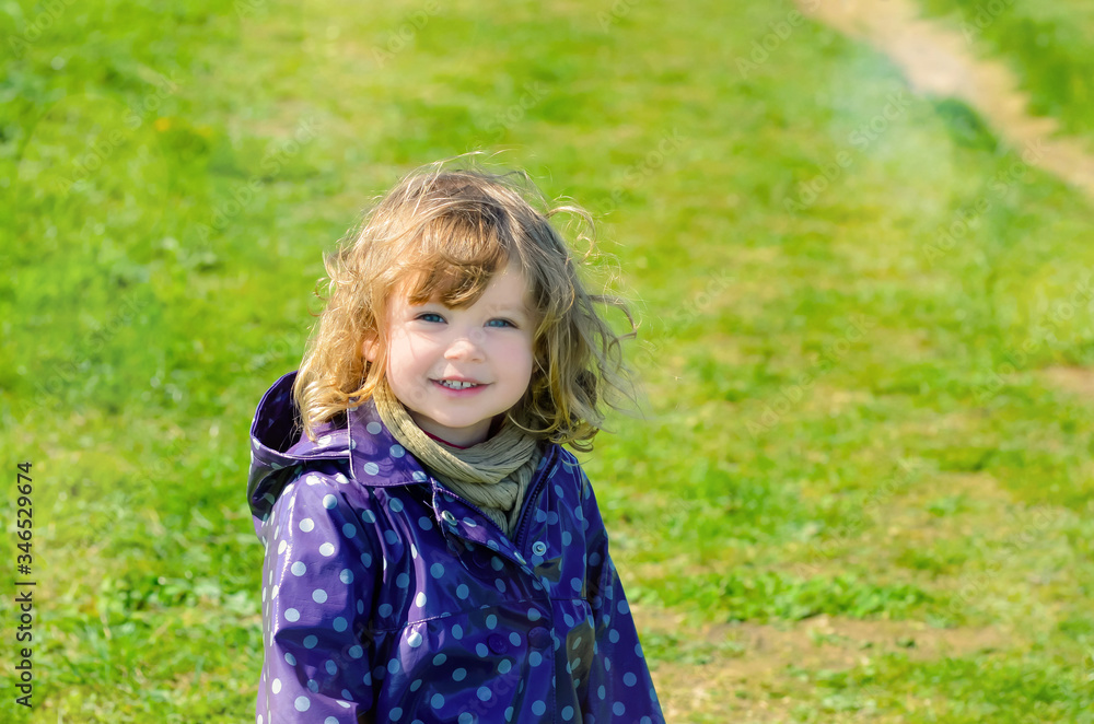 little girl walking in the paths in spring little girl walking in the paths in spring