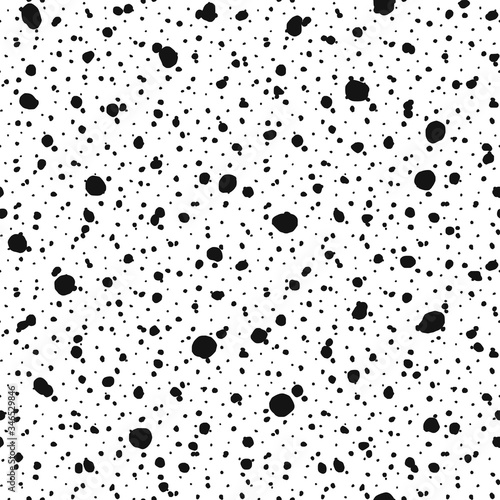 Seamless pattern. Shapeless circles and dots of different sizes.