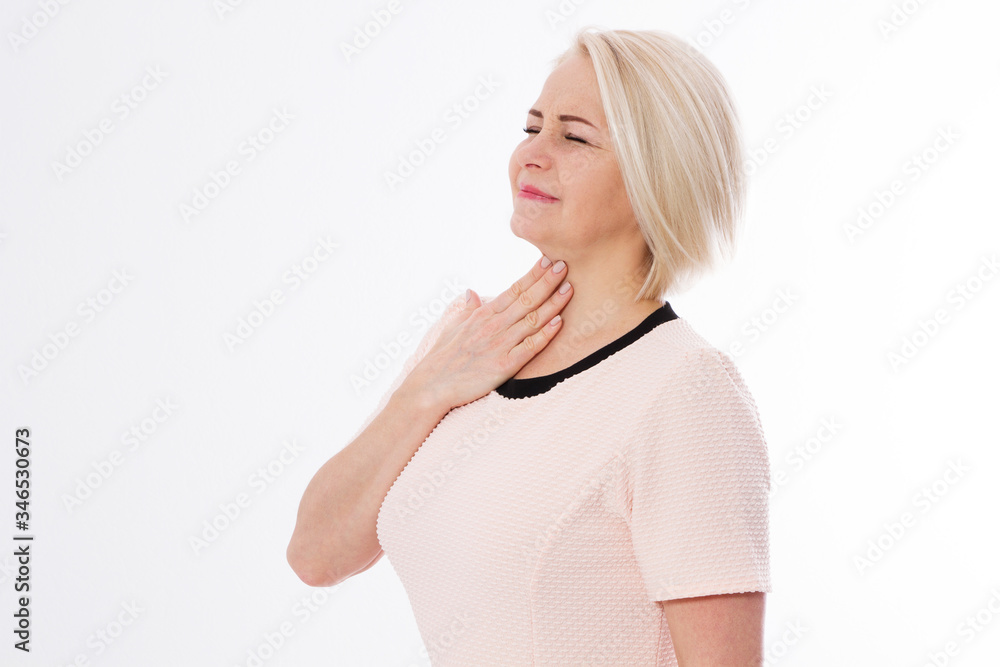 Sore throat woman pain, middle age woman suffer sore throat pain and touching her heck, female cold