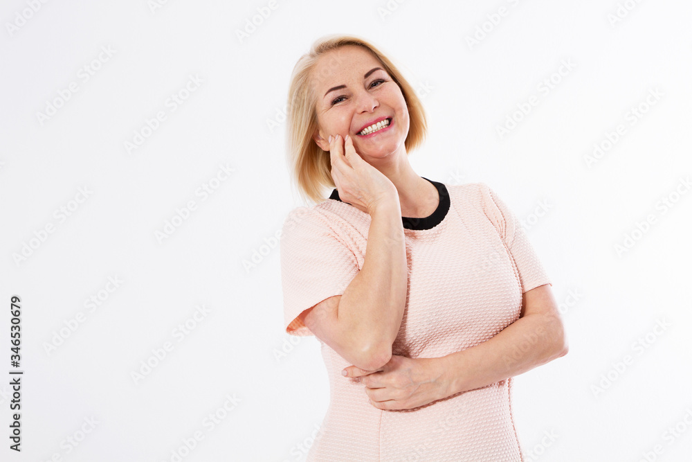 Smiling happy woman isolated ob white background, friendly face life style concept, middle-aged female posing over white Smiling happy woman isolated ob white background, friendly face life style concept, middle-aged female posing over white