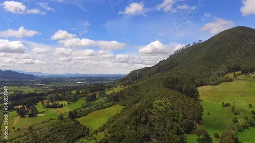 High mountains of mythical figures, trees and a clear sky all in Tabio photo