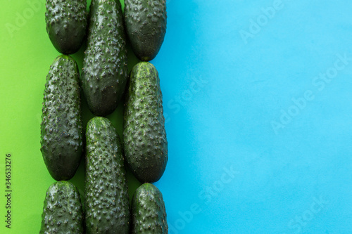 Cucumbers on blue background  Cucumbers view from a top.