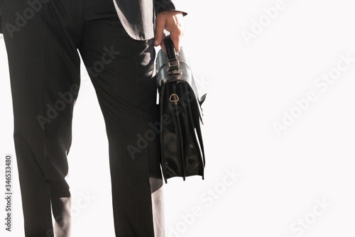 Cutouts of Businessman holding brief case bag