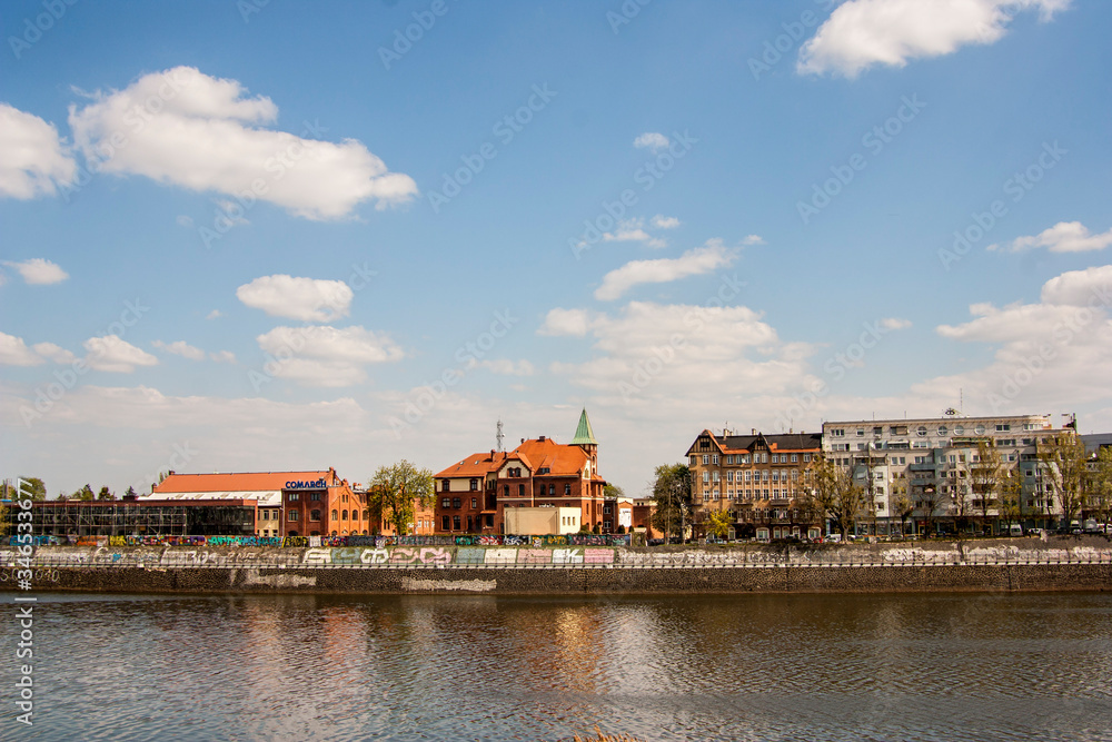 Obraz premium river, city, water, architecture, europe, sky, travel, town, building, panorama, blue, cityscape, tourism, landscape, urban, reflection, old, sea, bridge,view, prague, embankment, ho