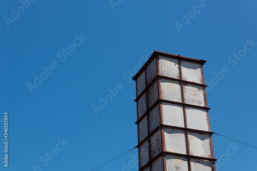 Sloss Furnaces National Historic Landmark, Birmingham Alabama USA, steel framed tower isolated against a blue sky, creative copy space, horizontal aspect photo