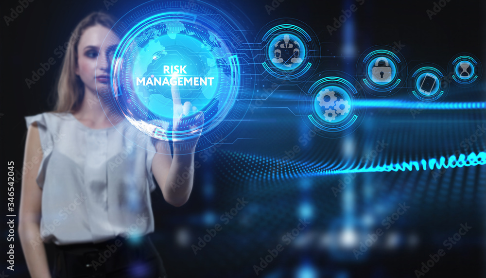 Fototapeta premium Business, Technology, Internet and network concept. Young businessman working on a virtual screen of the future and sees the inscription: Risk management