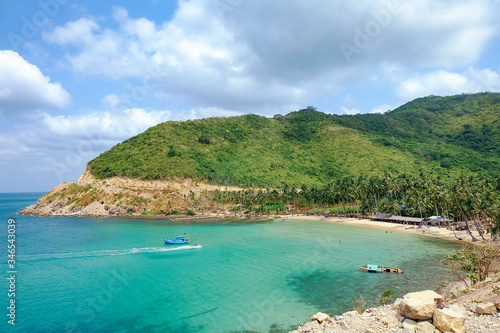 The beautiful tropical beach of Nam Du, the paradise island with the coast, white sand, clean water, boat, forest and blue sky. Nam Du island is a popular tourist destination in Kien Giang, Vietnam