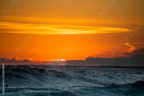 Sunset with surfing in Bali