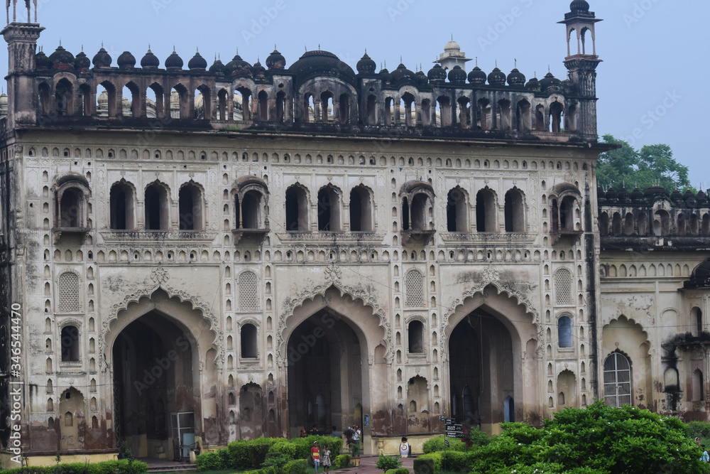 old famous bara imambara fort in lucknow, with blue sky 