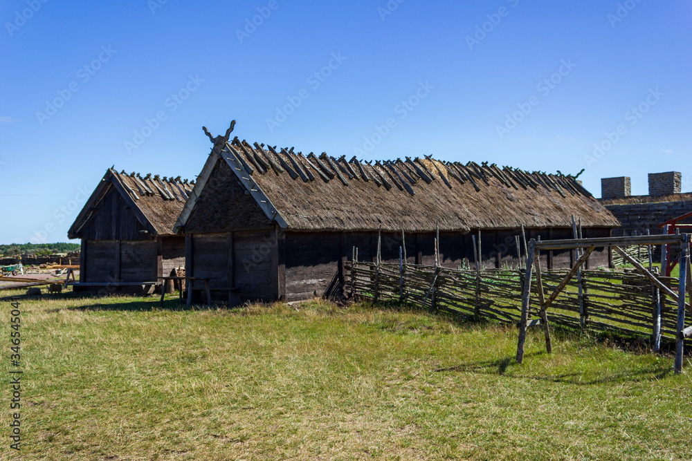 Thatched huts in Eketorps borg, a viking village in Öland, Sweden