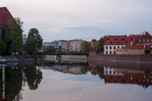 river  water  architecture  city  lake  reflection  house  europe  sky  travel  landscape  building  town  italy  view  blue  old  houses  village  bridge  urban  church  castle  pond  tourism wroclaw