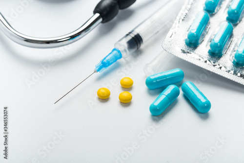 Capsule pills and syringe vaccine concept