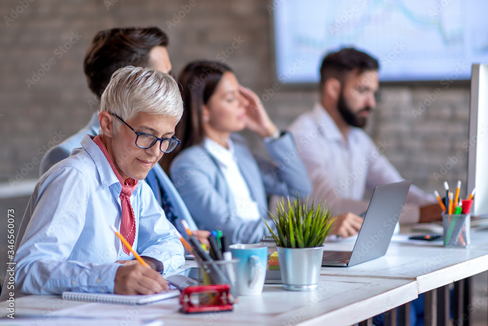 Group of people work in office.