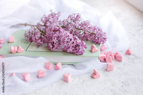 Lay Flat book, the branch of lilac, marshmallow in the shape of a heart. Postcard