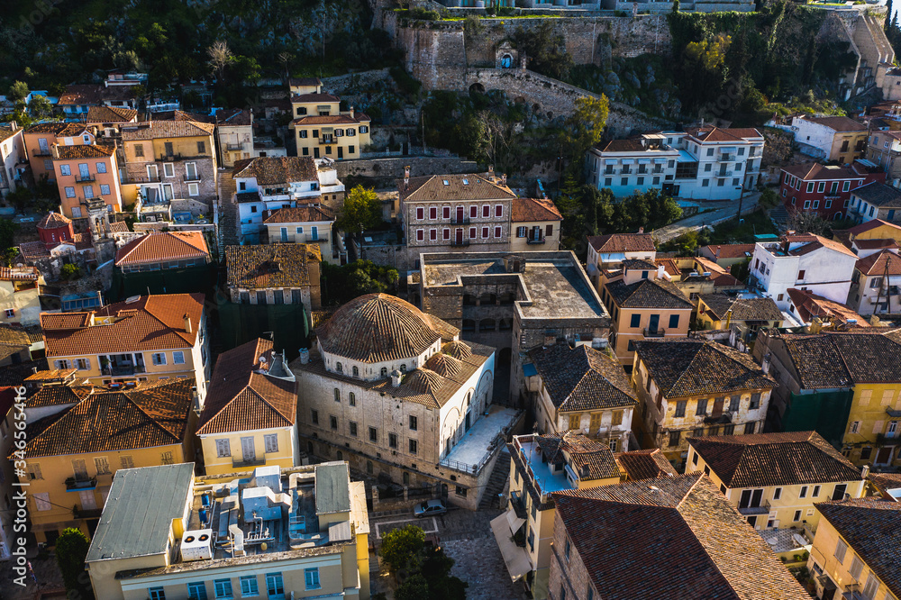 Fototapeta premium Old traditional church and streets of Nafplion, Greece, Peloponnese aerial view of the city