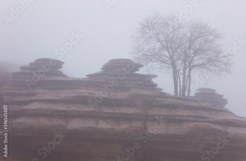 Landscape with fog in the Torcal de Antequera Natural Area. Antequera, Malaga province, in the autonomous community of Andalusia, Spain, Europe