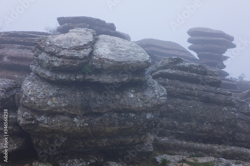 Landscape with fog in the Torcal de Antequera Natural Area. Antequera, Malaga province, in the autonomous community of Andalusia, Spain, Europe
