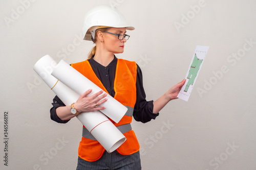 A girl in a construction he...