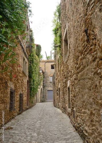 Medieval narrow stone alley in village  of Girona province  Spain