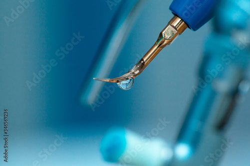 фотографія Periodontal ultrasonic scaler is a dental instrument used primarily in the prophylactic and periodontal care of human teeth - tartar removal