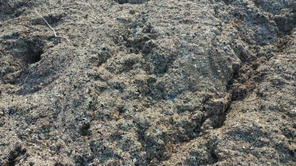 Pollution concept. Top view of Garbage pile in landfill in Thailand
Pollution concept. Top view of Garbage pile in landfill in Thailand