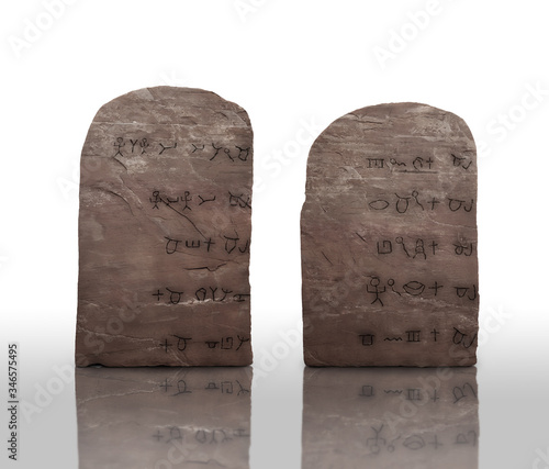 Tablets laws of the 10 ten commandments of God of Israel Jehovah carved on stone in pictographic Hebrew, paleo Hebrew realistic texture, given to Moses the Hebrew Jew, covenant of Christians Judaism photo