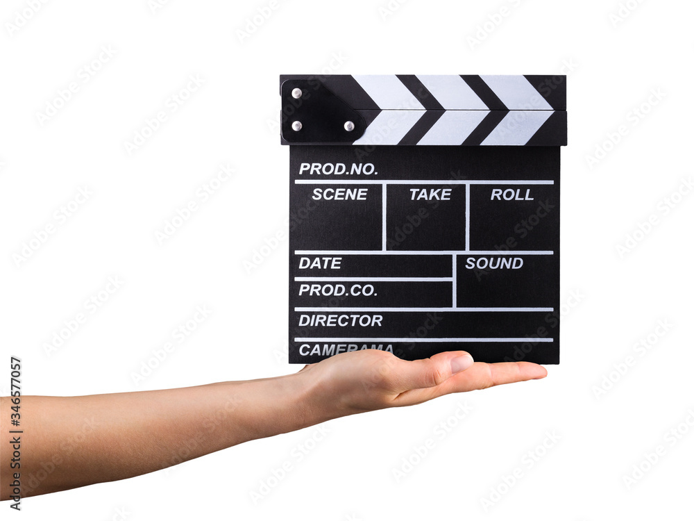 Human hand holding film clapper board isolated on white background