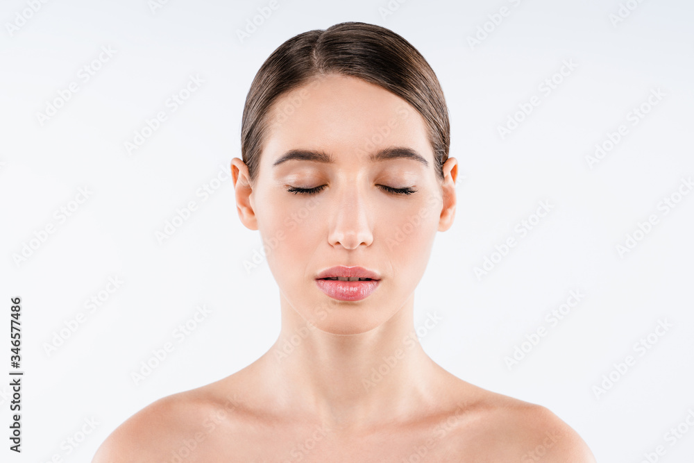 Front portrait of beautiful face with beautiful closed eyes isolated on white background Front portrait of beautiful face with beautiful closed eyes isolated on white background