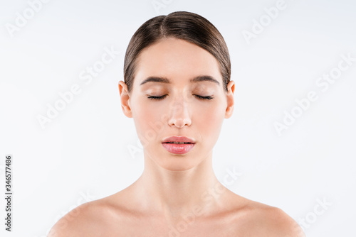 Front portrait of beautiful face with beautiful closed eyes isolated on white background