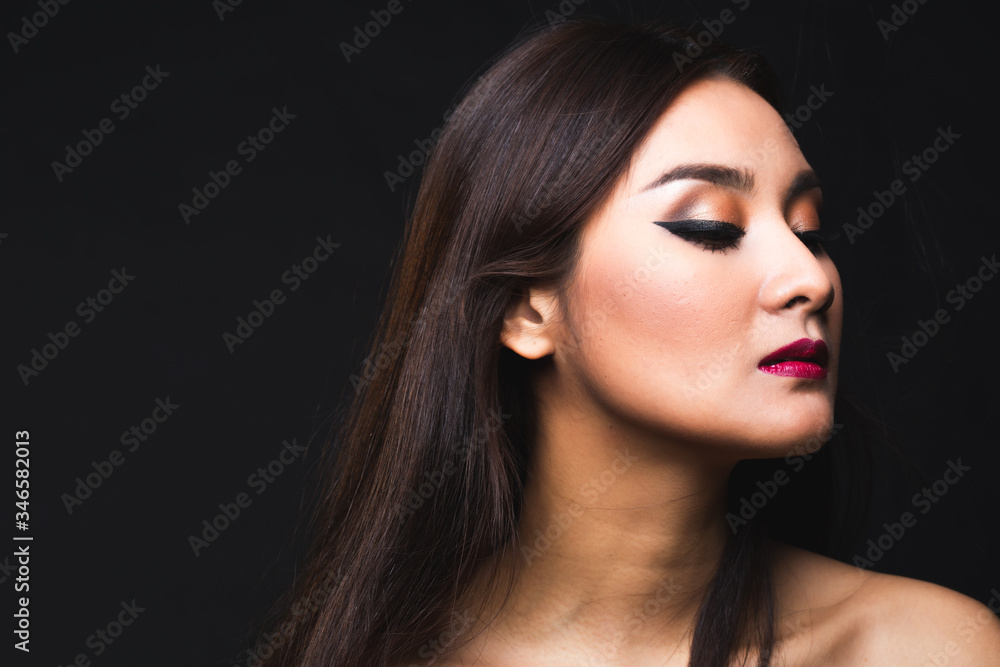 Fototapeta premium Portrait of young asian woman with makeup long hair.