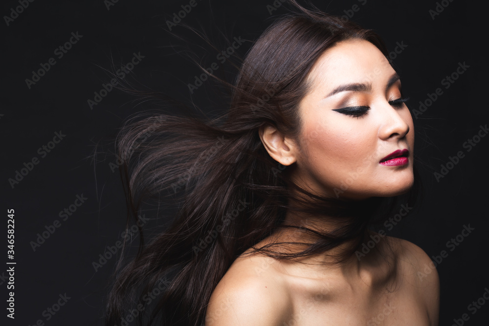 Fototapeta premium Portrait of young asian woman with makeup long hair.