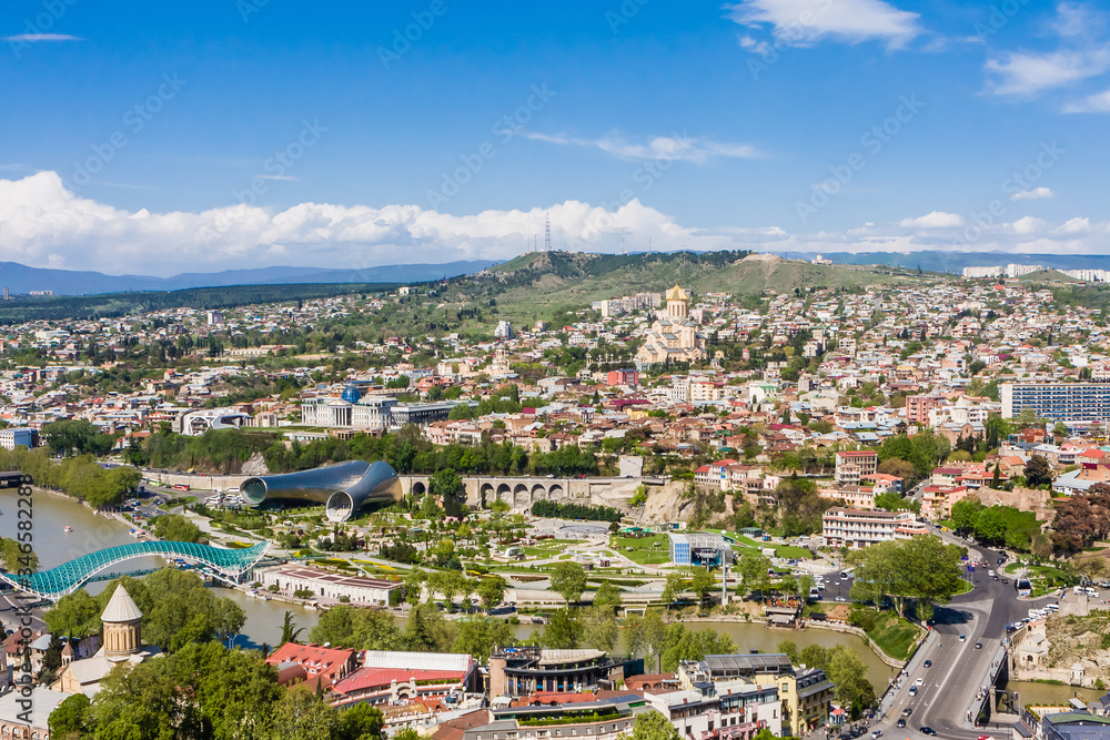 Panoramic view of Tbilisi city from the Narikala Fortress, old town and modern architecture.  Georgia