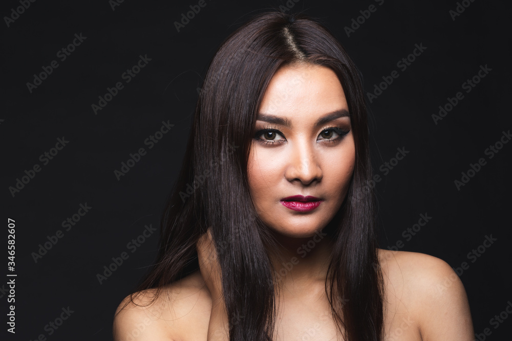 Fototapeta premium Portrait of young asian woman with makeup long hair.
