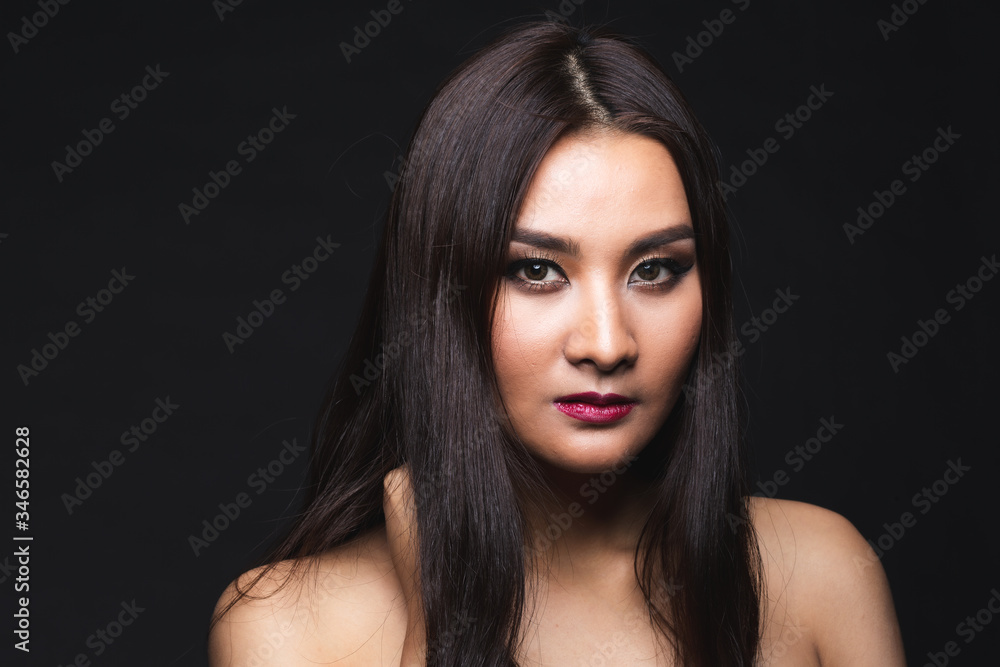 Fototapeta premium Portrait of young asian woman with makeup long hair.