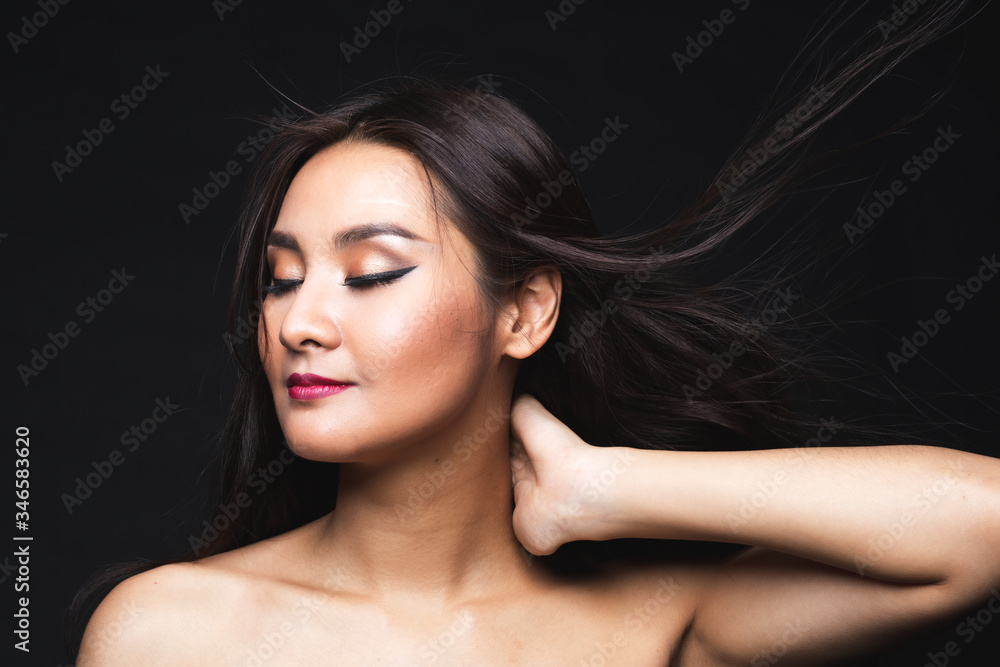 Portrait of young asian woman with makeup long hair.