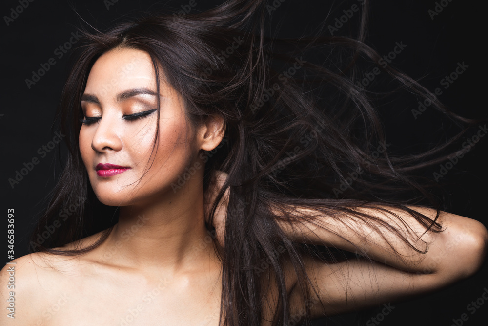 Portrait of young asian woman with makeup long hair. Portrait of young asian woman with makeup long hair.