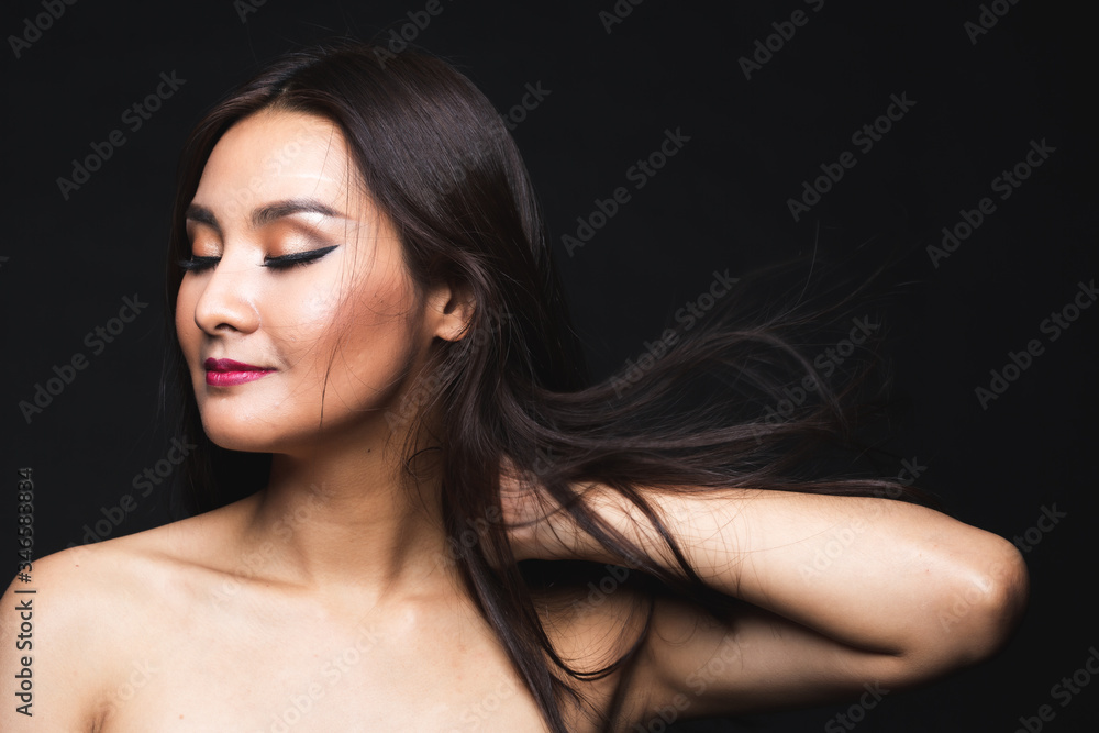 Portrait of young asian woman with makeup long hair. Portrait of young asian woman with makeup long hair.