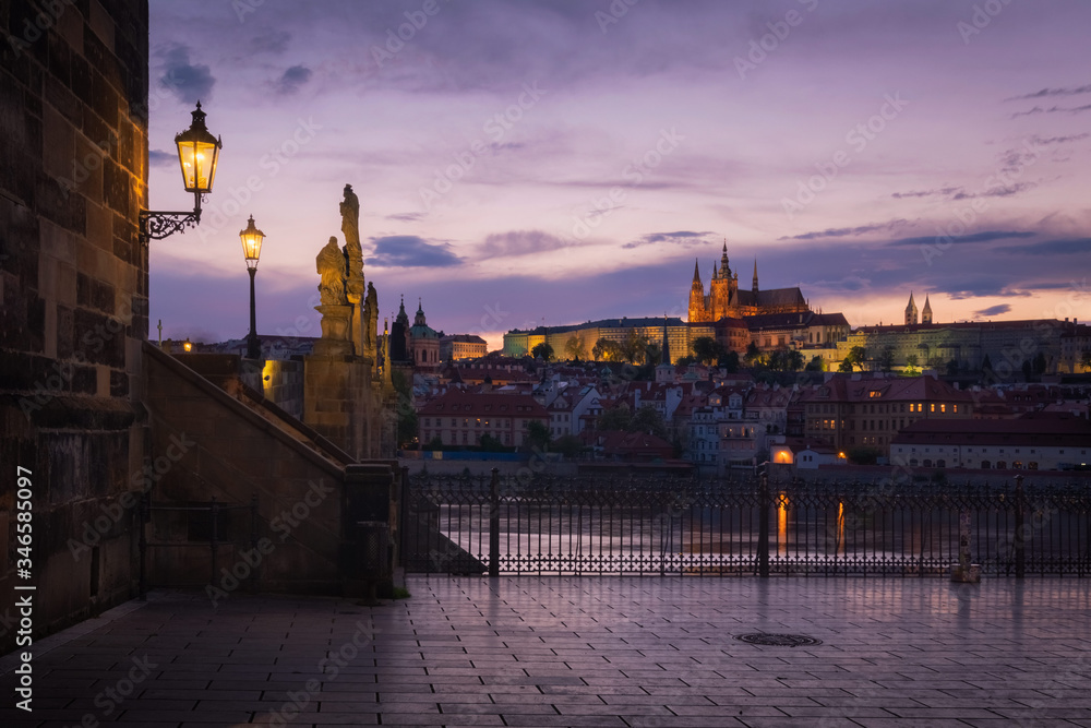 Prague castle and Charles bridge from Krizovnicke square in the evening light. Prague.