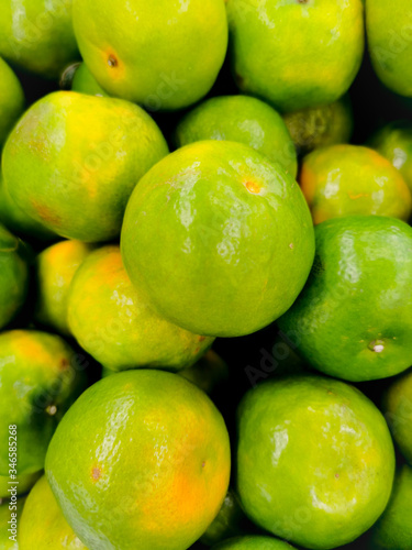 Beautiful texture fresh lemon orange lime tangerine and grapefruit background, fruit orange pattern