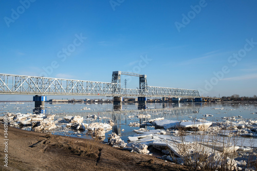 Spring evening in Arkhangelsk. Ice drift on the Severnaya Dvina river. The world's northernmost drawbridge.