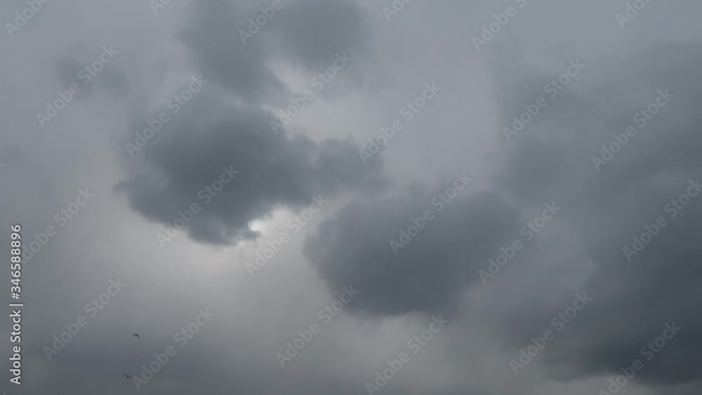 time-laps of gray clouds floating in the sky.
sometimes the sun peeps through the clouds. time-laps of gray clouds floating in the sky.
sometimes the sun peeps through the clouds.
