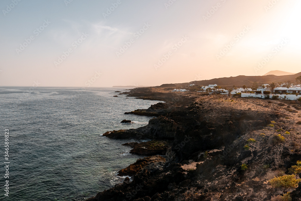Rocky coast line in norther Lanzarote, Canary Islands at sunset