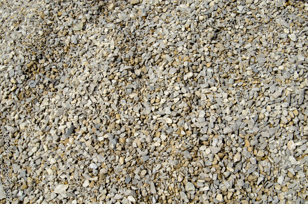 Texture of fine gravel photo in the sunshine Texture of fine gravel photo in the sunshine