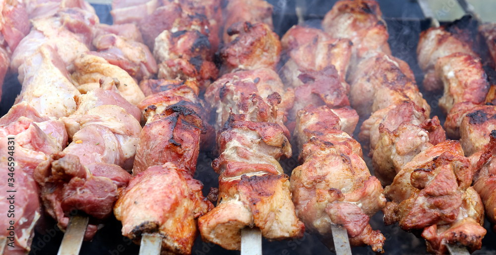 Grilled beef cabobs close-up on an open fire. Grilled beef cabobs close-up on an open fire.