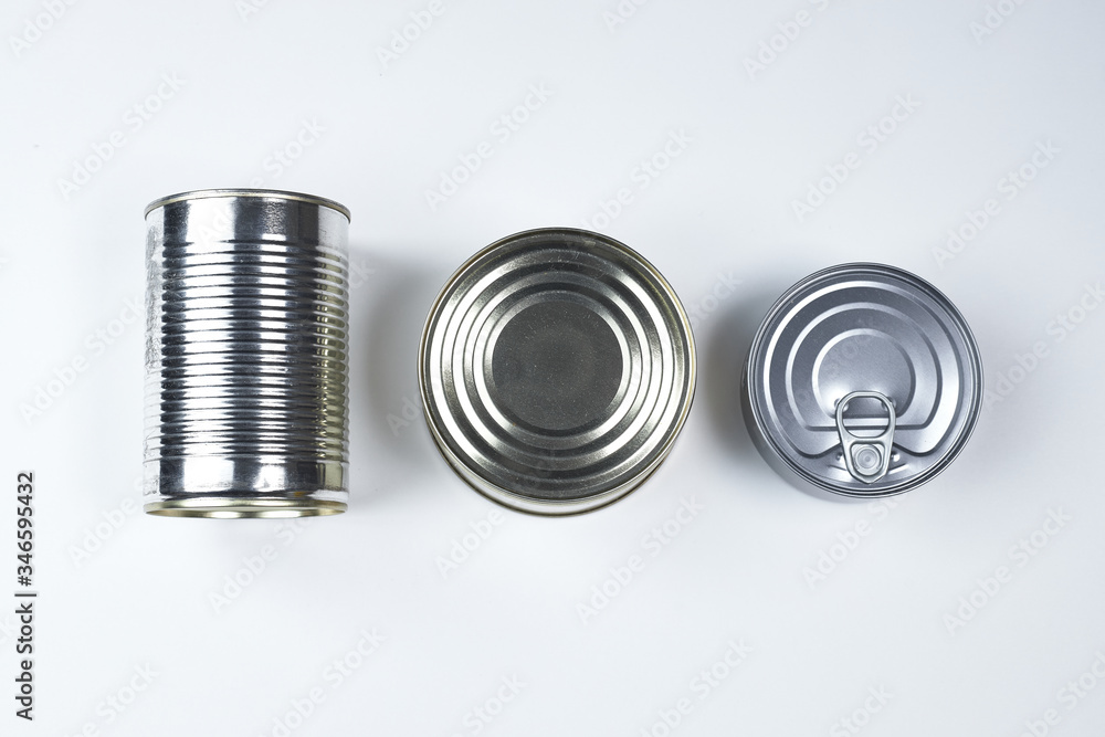 tin cans of different sizes on a white background tin cans of different sizes on a white background