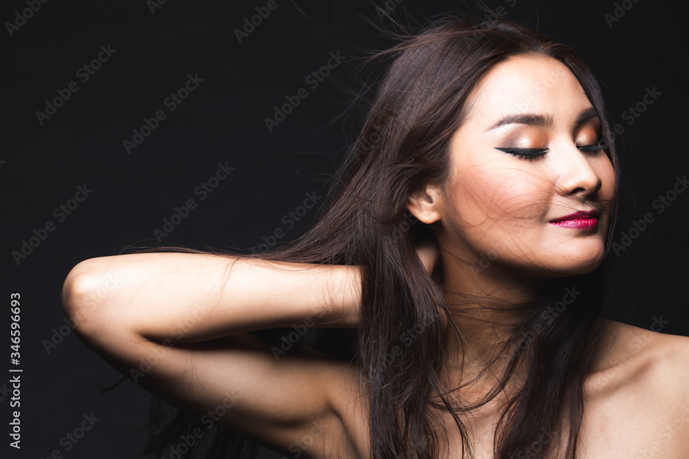 Portrait of young asian woman with makeup long hair. Portrait of young asian woman with makeup long hair.