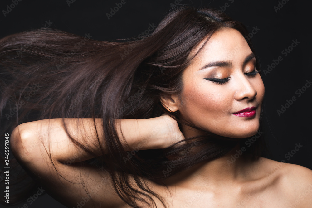 Portrait of young asian woman with makeup long hair. Portrait of young asian woman with makeup long hair.