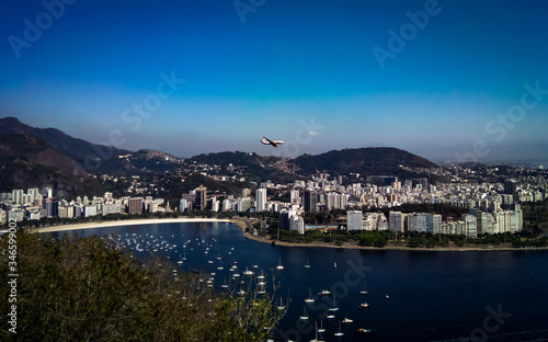 View of Rio de Janeiro with plane overflight, Sugarloaf cable car, Rio de Janeiro, Brazil